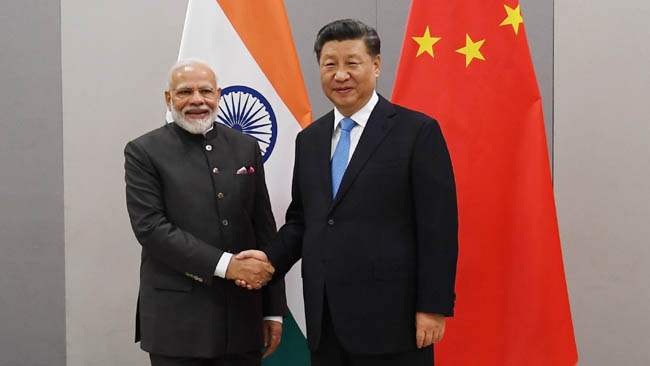 Meeting of Prime Minister with Mr. Xi Jinping, President of the People's Republic of China on the margins of the 11th BRICS Summit